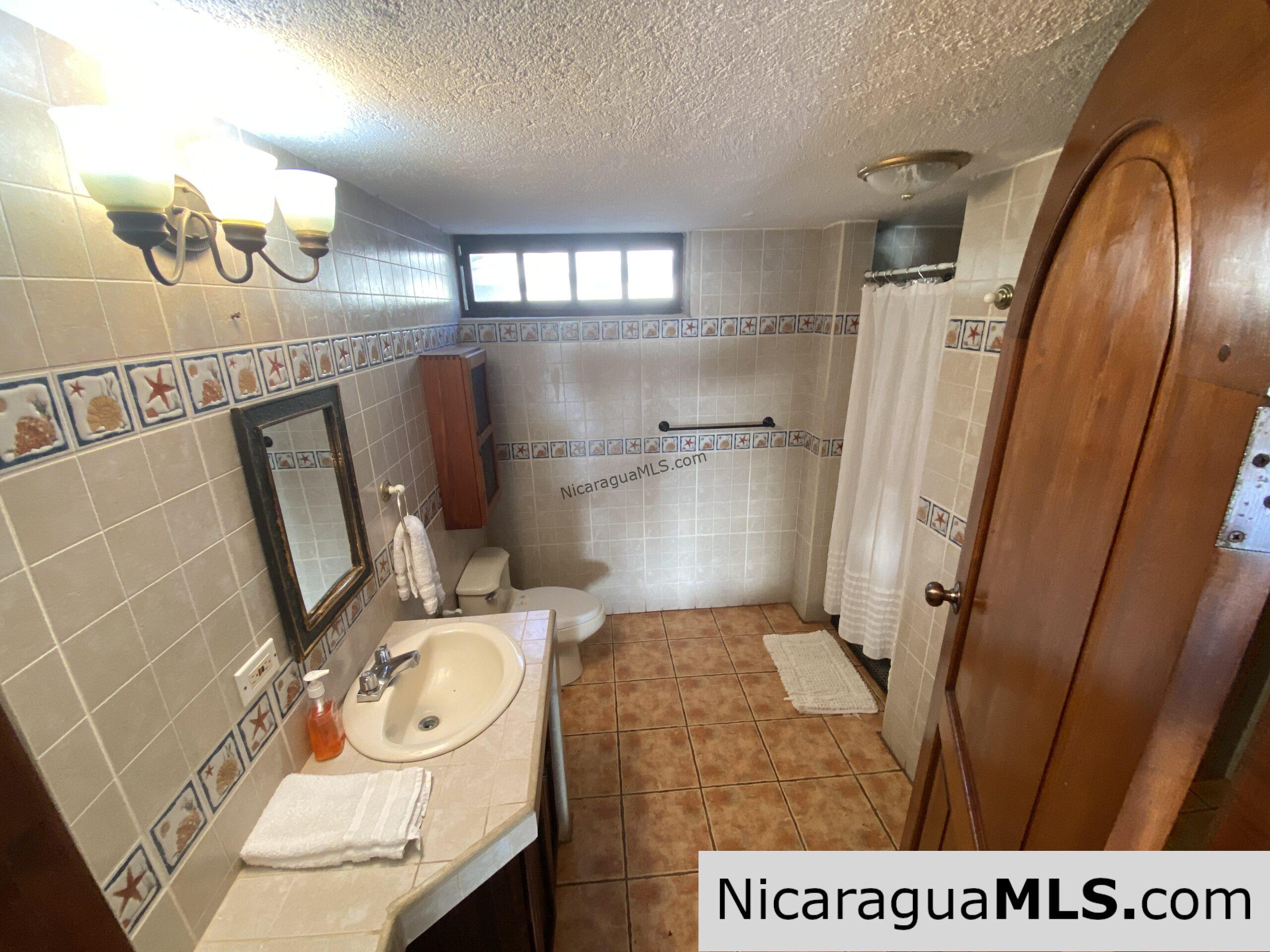 SOLD - Landmark entertainer home in a quiet, gated development mere minutes from town. - Image 13