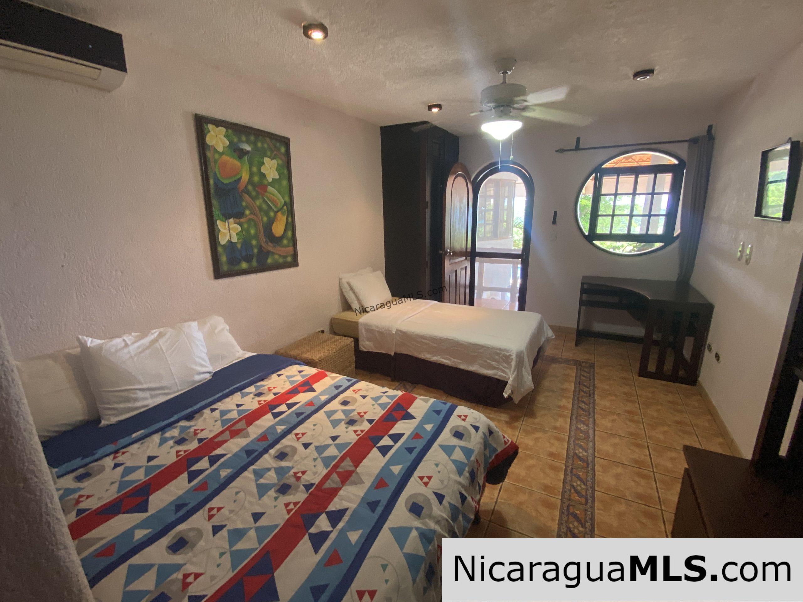 SOLD - Landmark entertainer home in a quiet, gated development mere minutes from town. - Image 12