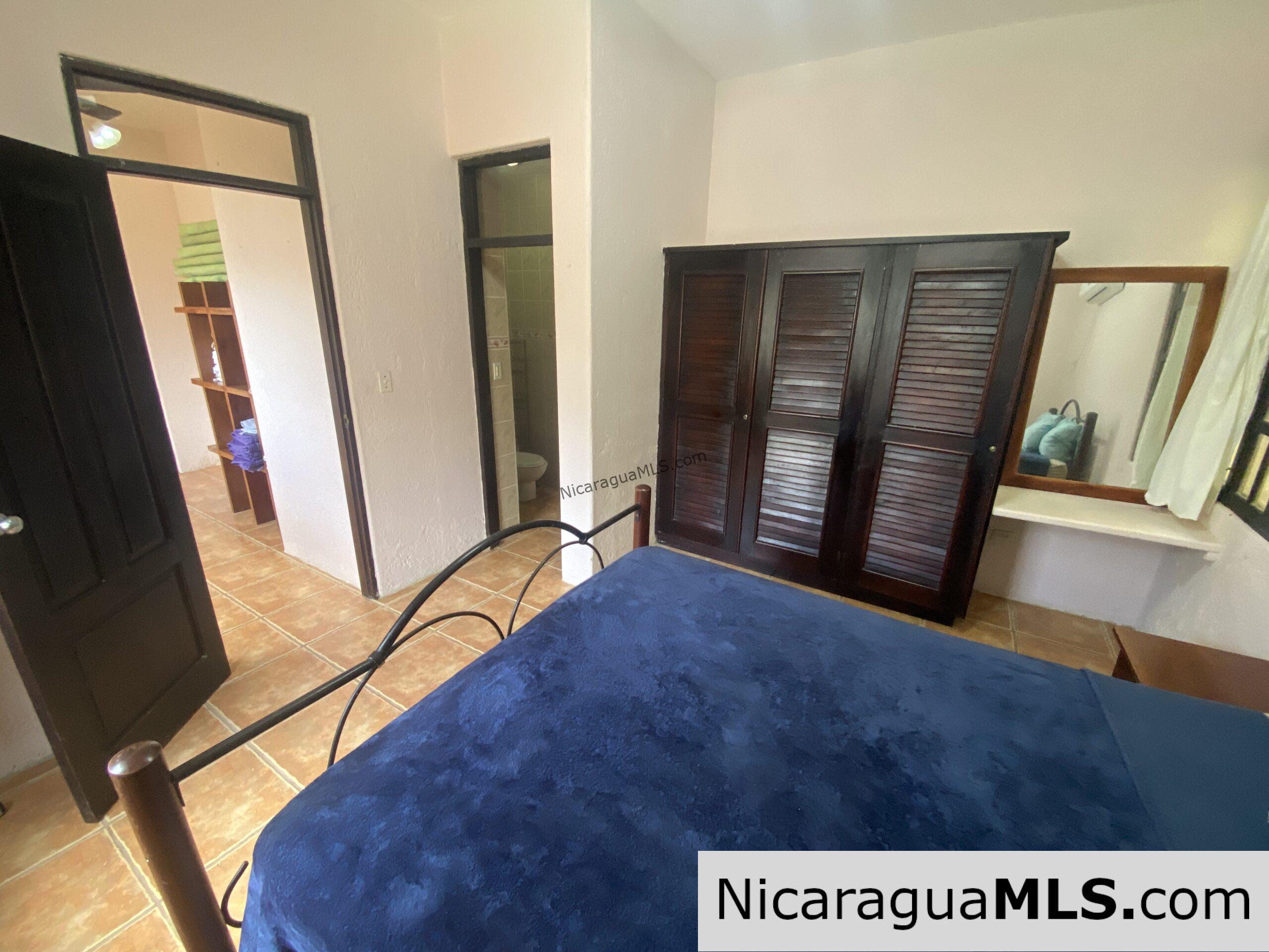 SOLD - Landmark entertainer home in a quiet, gated development mere minutes from town. - Image 16