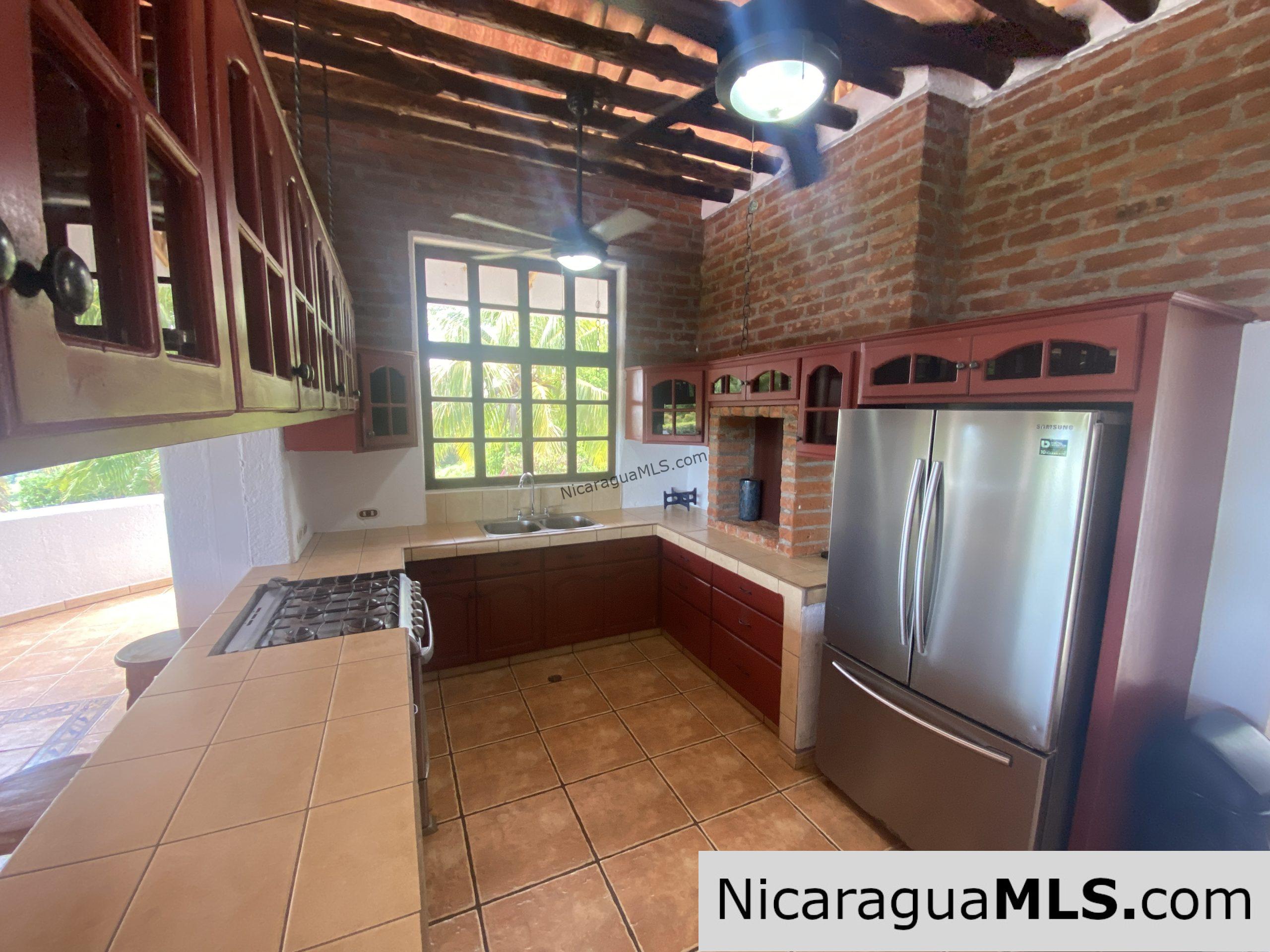 SOLD - Landmark entertainer home in a quiet, gated development mere minutes from town. - Image 4