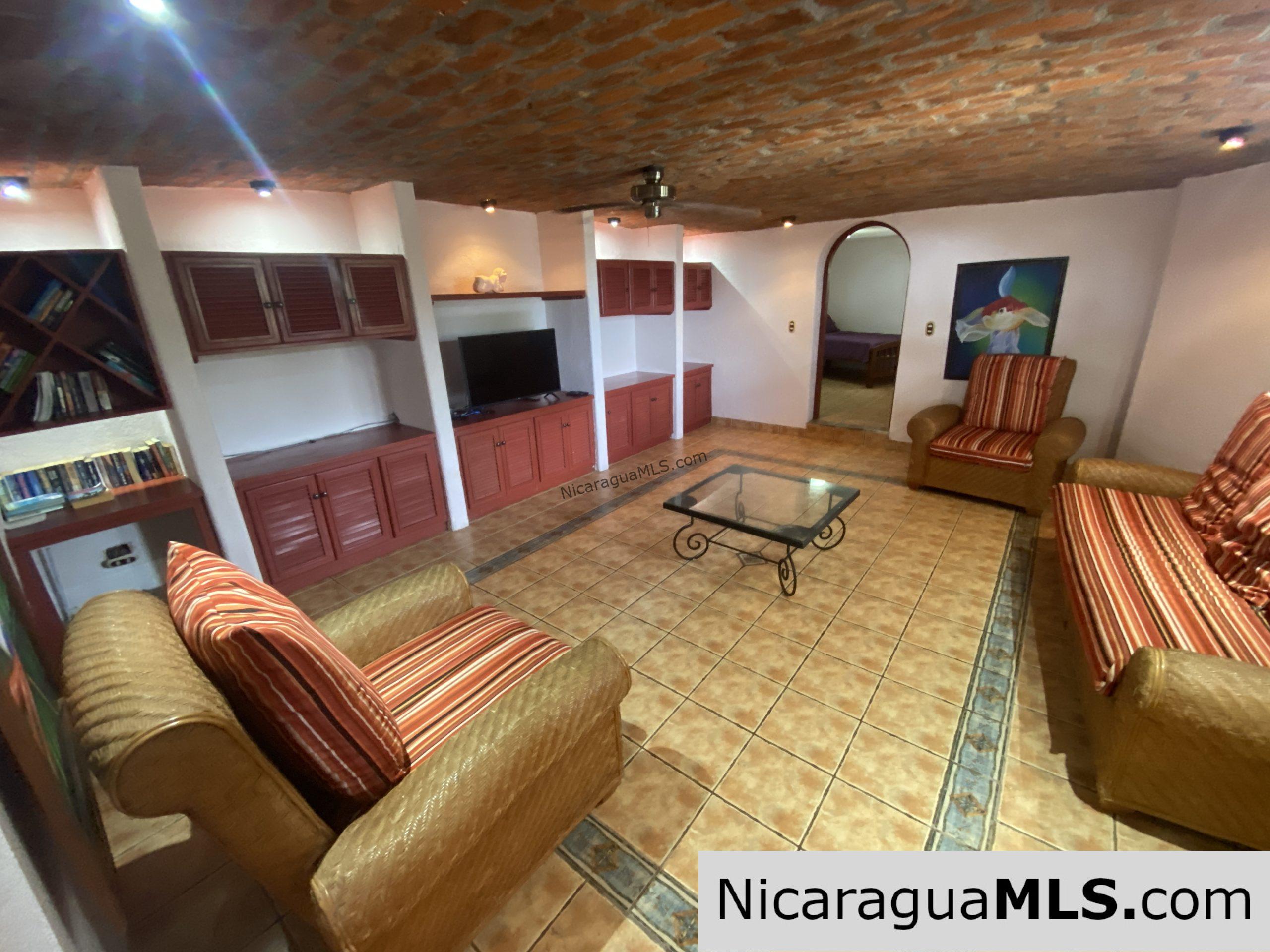 SOLD - Landmark entertainer home in a quiet, gated development mere minutes from town. - Image 14