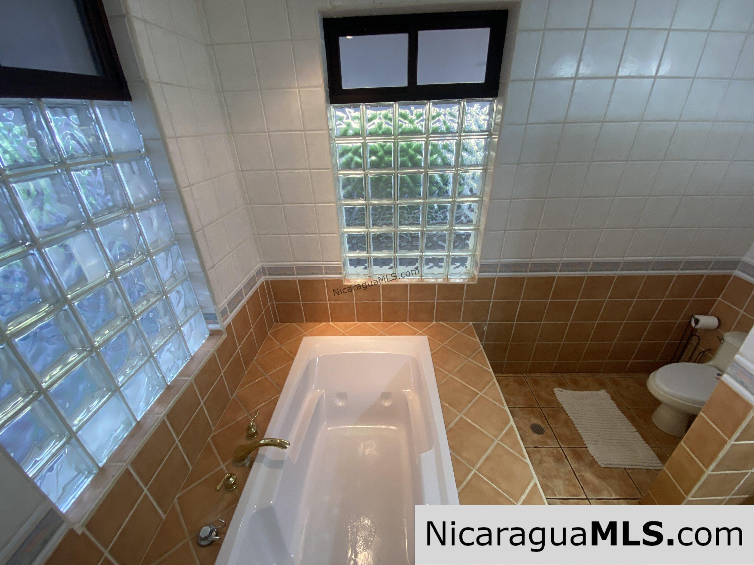 SOLD - Landmark entertainer home in a quiet, gated development mere minutes from town. - Image 10