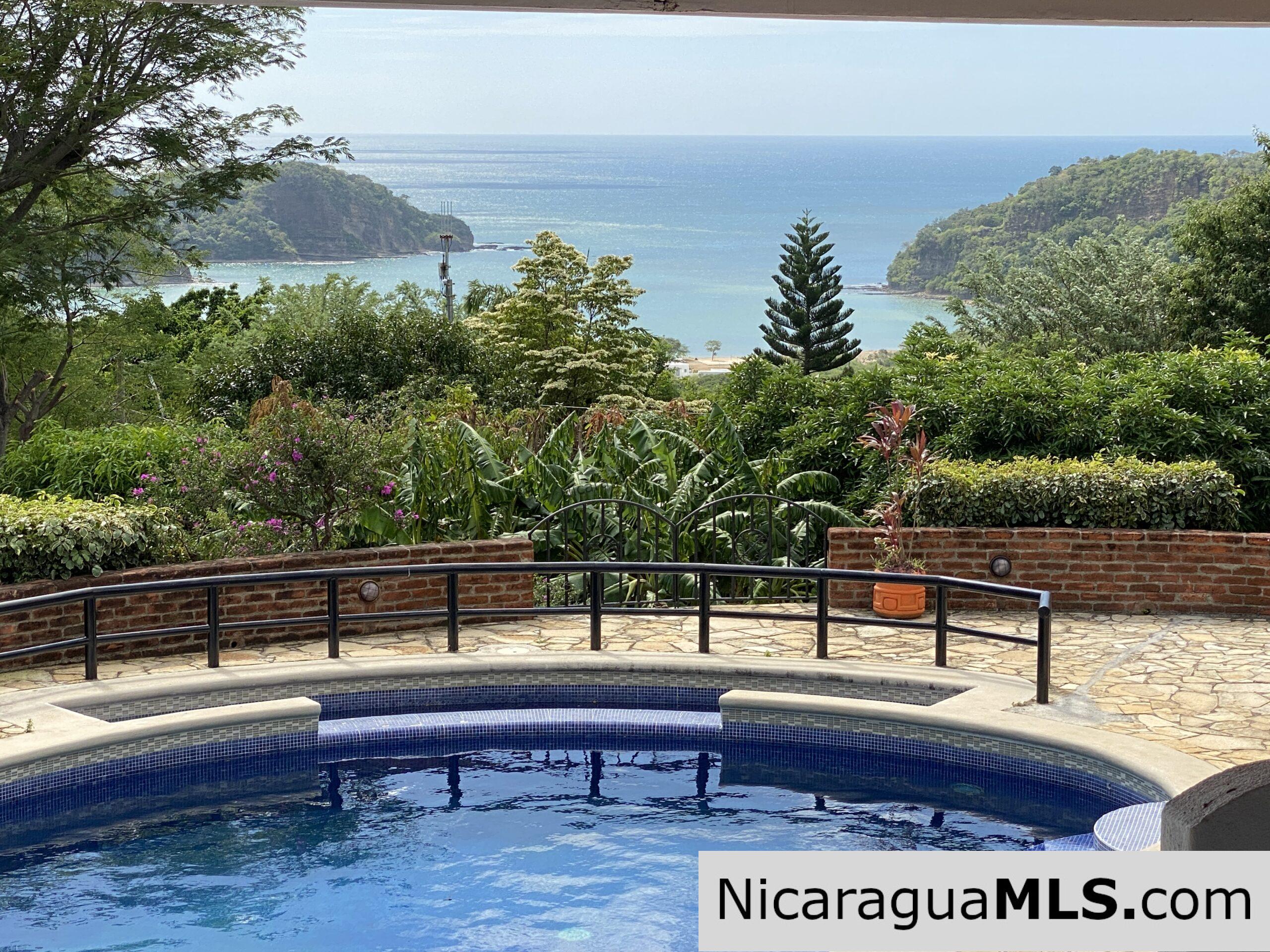 SOLD - Landmark entertainer home in a quiet, gated development mere minutes from town. - Image 2