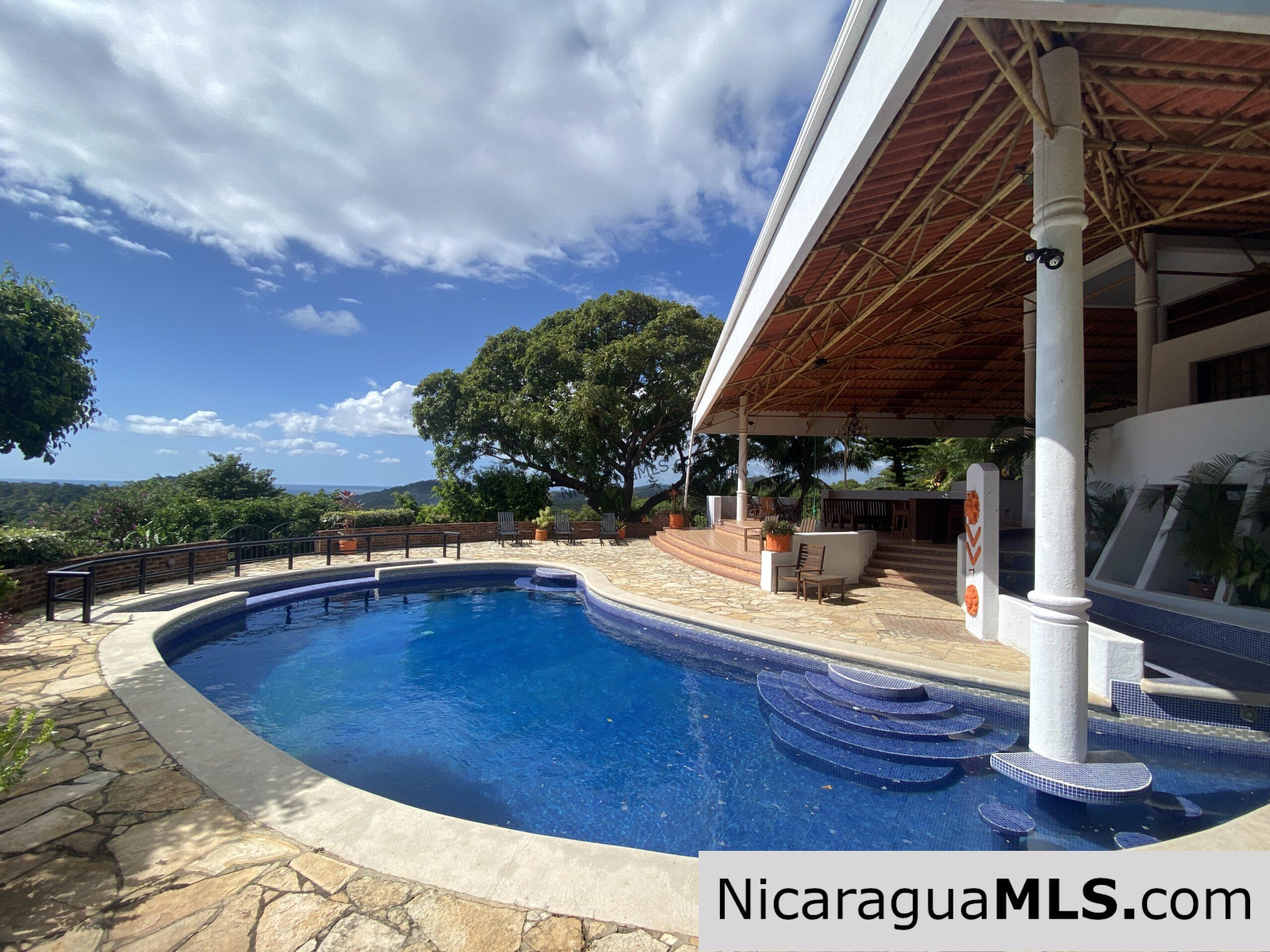 SOLD - Landmark entertainer home in a quiet, gated development mere minutes from town. - Image 3